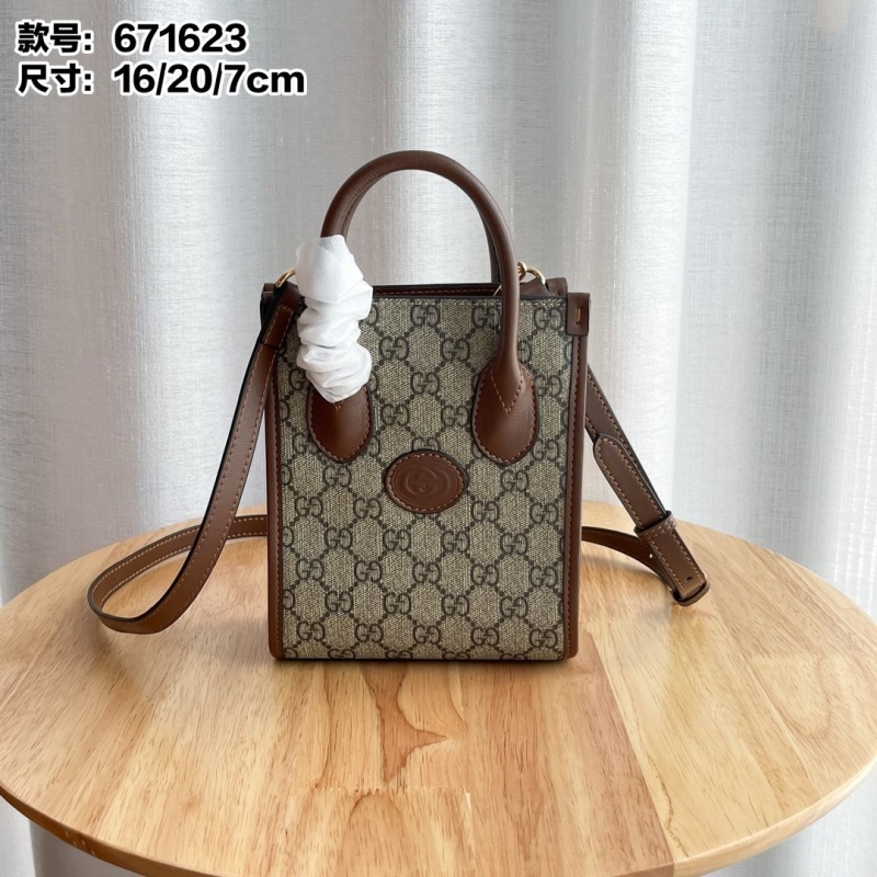 G*u*i top handle bags